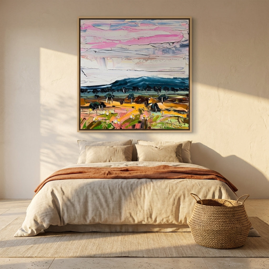 Canvas wall art with a natural timber surround styled on the wall in a Mediterranean bedroom