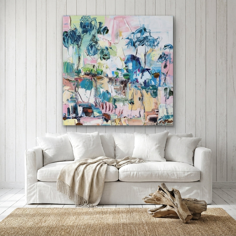 Stretched canvas wall art styled on the wall in a coastal living room