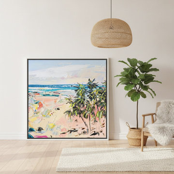 Oversized statement canvas wall art with a white surround leaning against the wall in a bright Scandinavian dining room