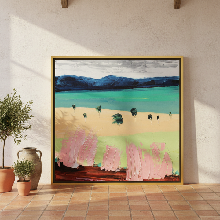 Oversized statement canvas wall art with a gold leaf surround leaning against the wall in a Mediterranean dining room