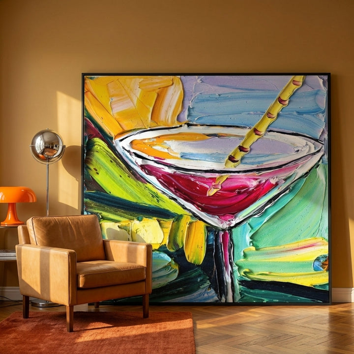 Oversized statement canvas wall art with a black surround leaning against the wall in a retro 70s living room