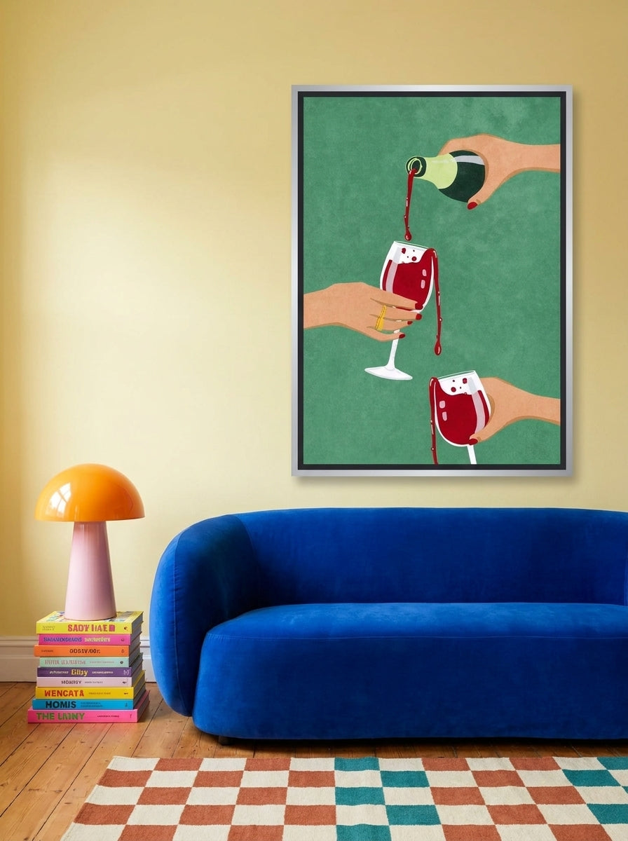 Canvas wall art with a silver leaf surround styled on the wall in a colourful eclectic living room