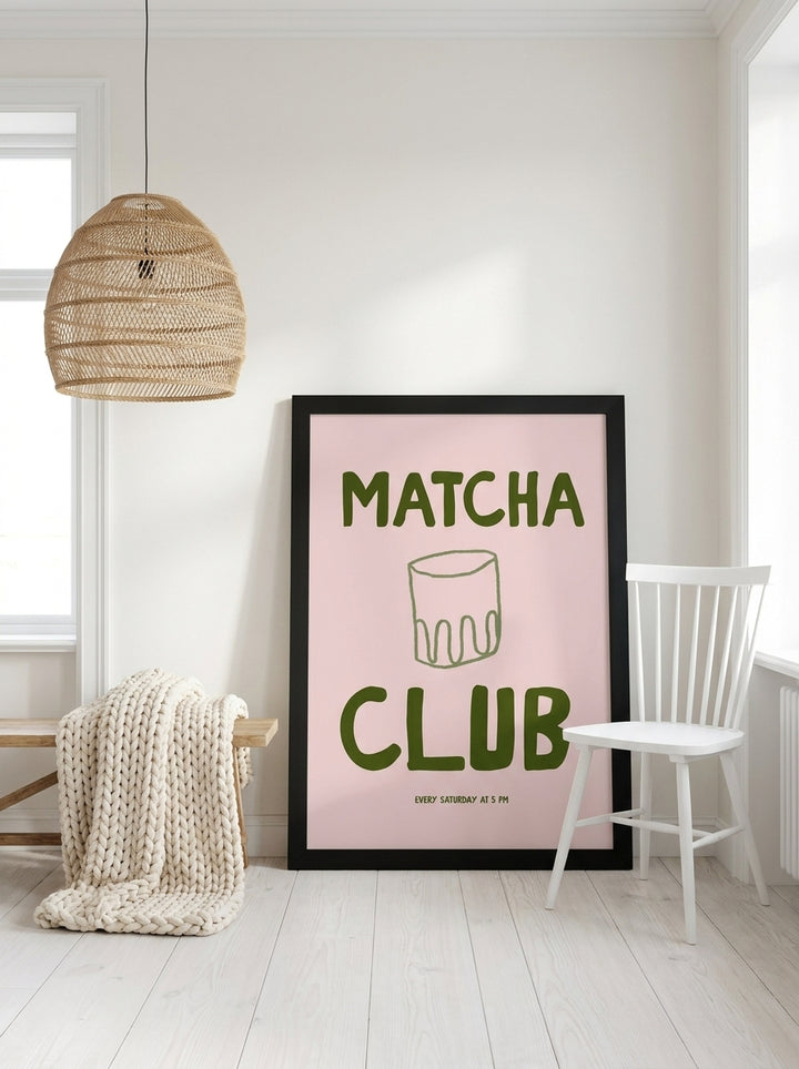 Oversized statement modern wall art print leaning against the wall in a bright Scandinavian dining room