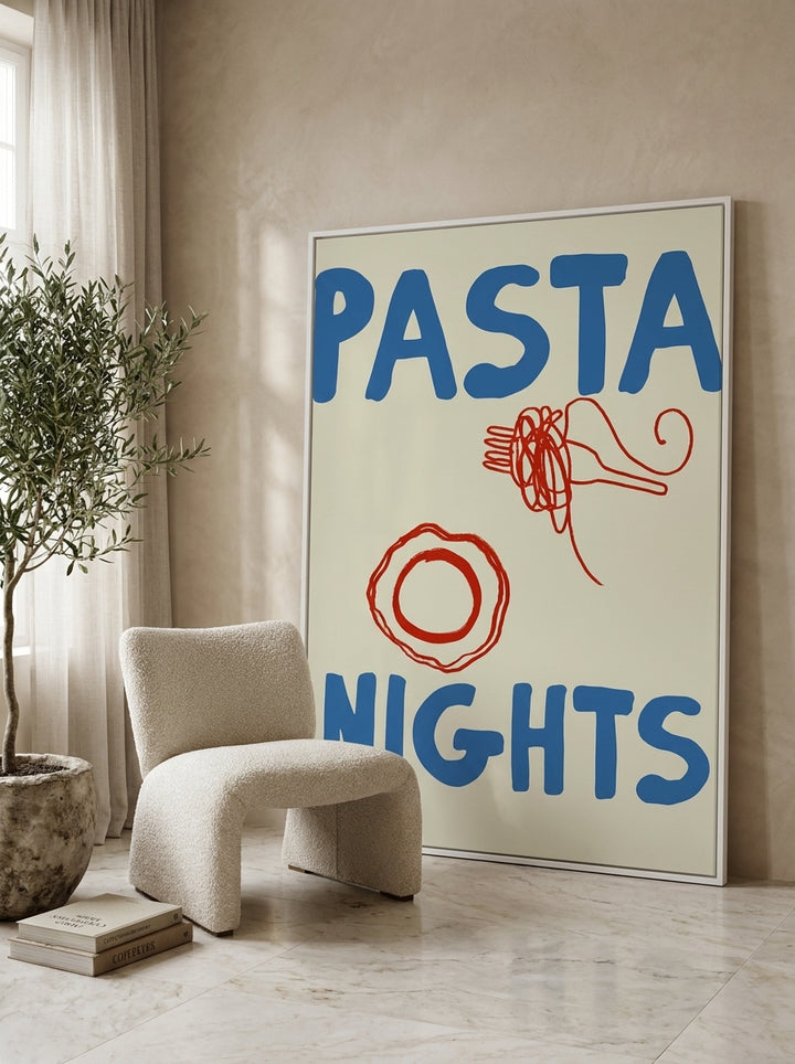 Oversized statement canvas wall art with a white surround leaning against the wall in a luxe dining room