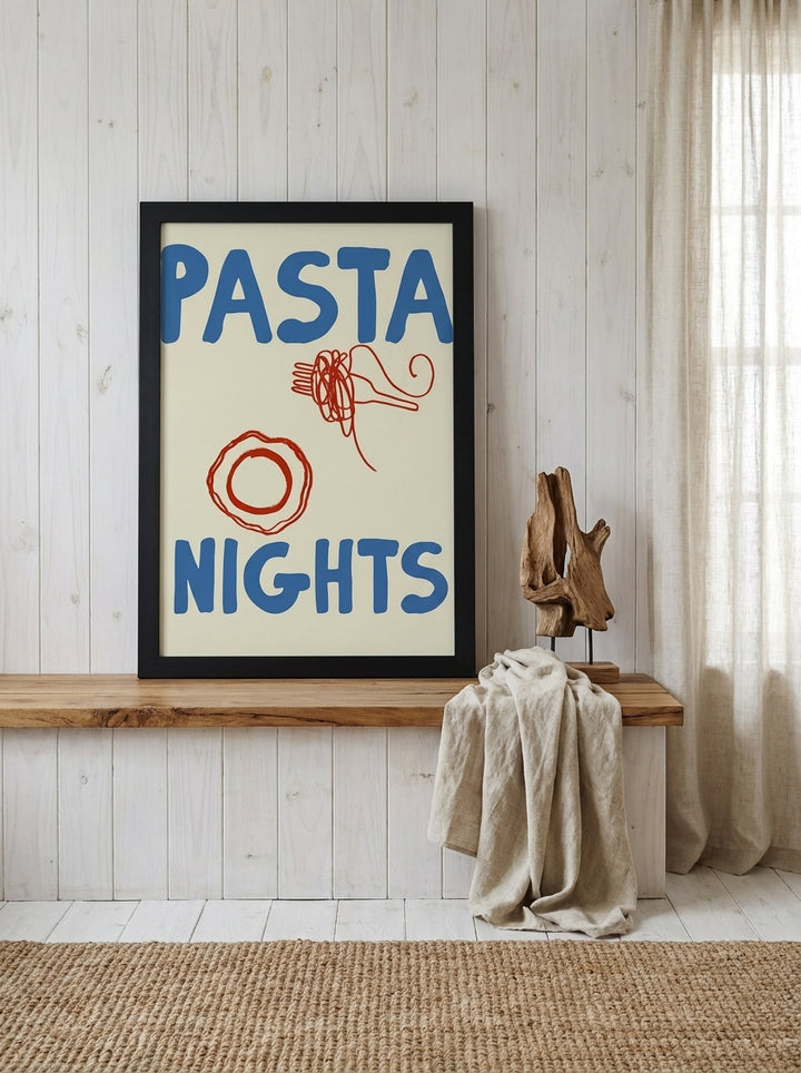 Modern wall art print standing on a kitchen bench in a coastal kitchen