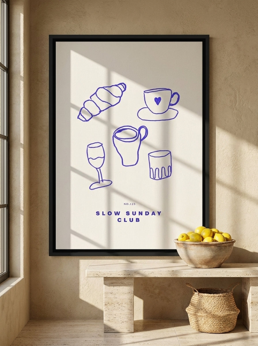 Canvas wall art with a black surround styled on the wall in a Mediterranean kitchen