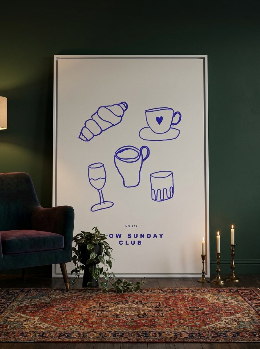 Oversized statement canvas wall art with a white surround leaning against the wall in a moody dining room
