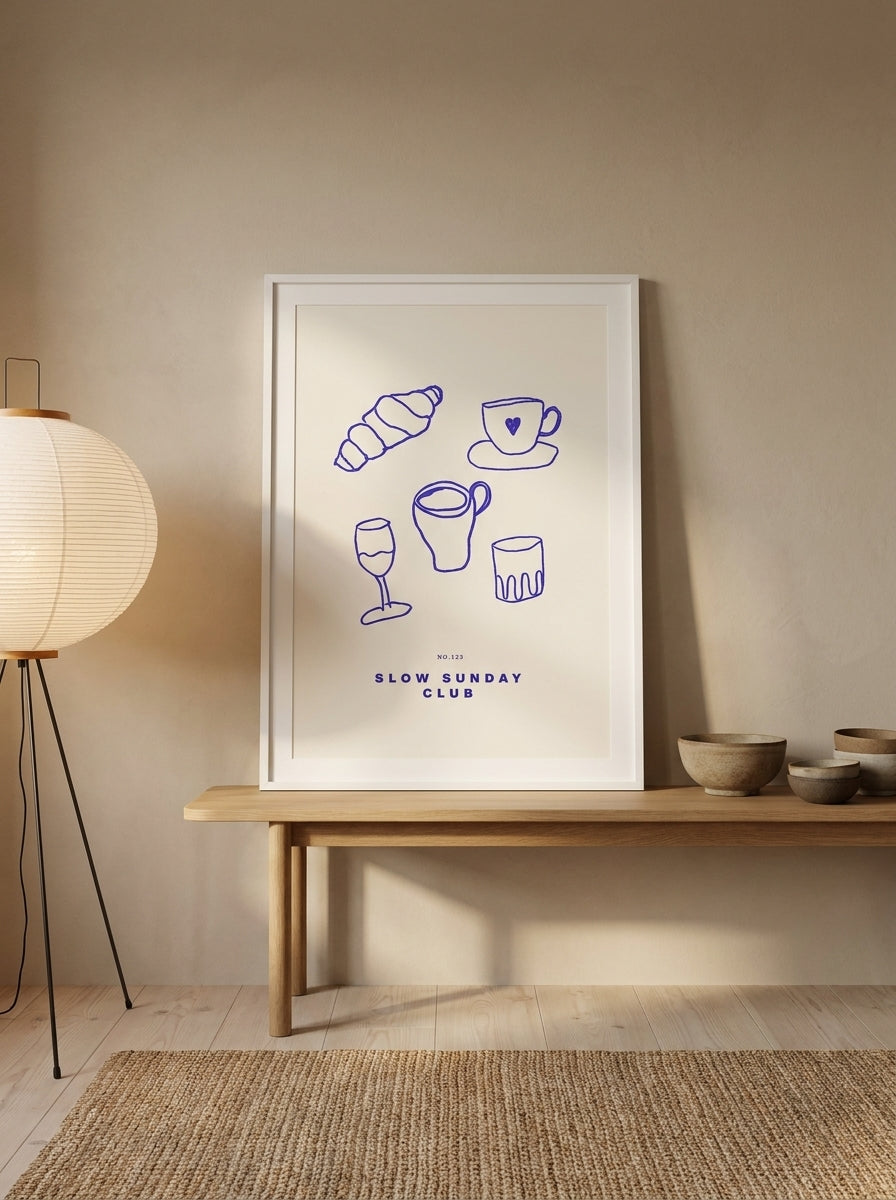 Modern wall art print standing on a bench in a warm Japandi living room