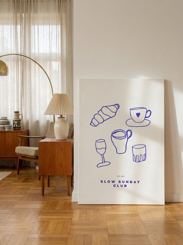 Stretched canvas wall art leaning against the wall in a mid-century living room