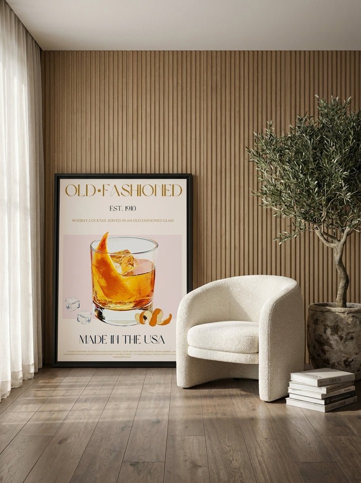 Canvas wall art with a black surround leaning against the wall in a luxe living room