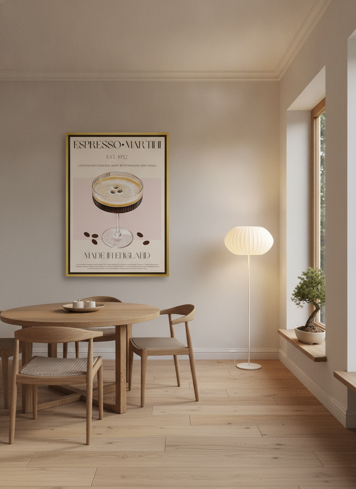 Oversized statement canvas wall art with a gold leaf surround styled on the wall in a warm Japandi dining room