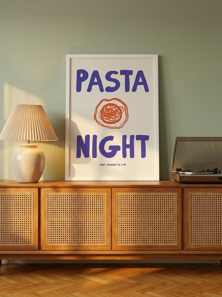 Modern wall art print standing on a sideboard in a mid-century living room