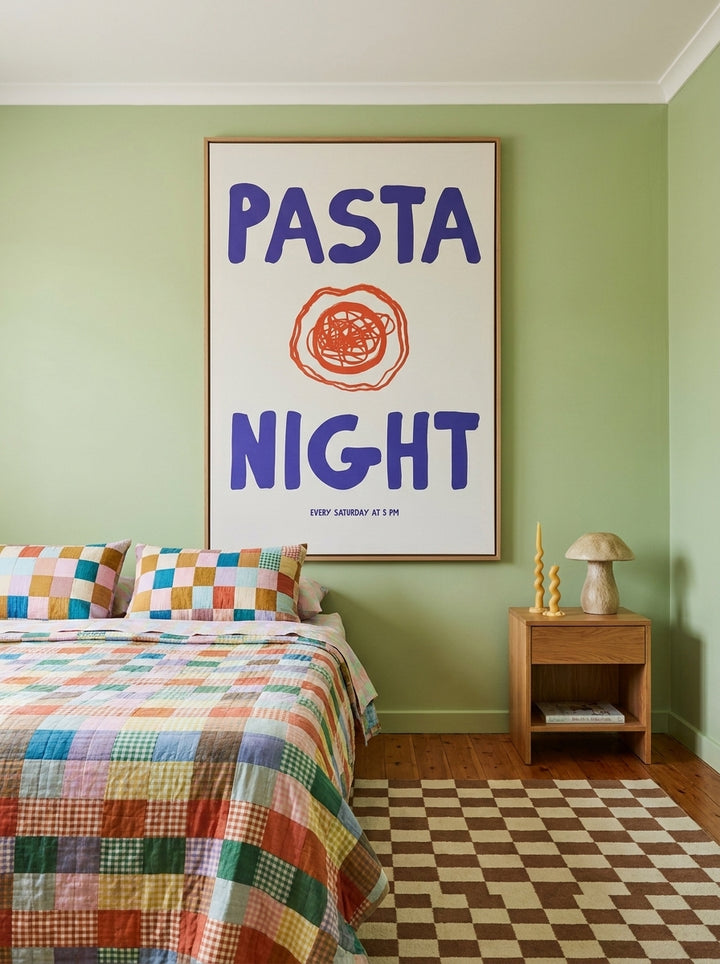 Oversized statement canvas wall art with a natural timber surround styled on the wall in a colourful eclectic bedroom