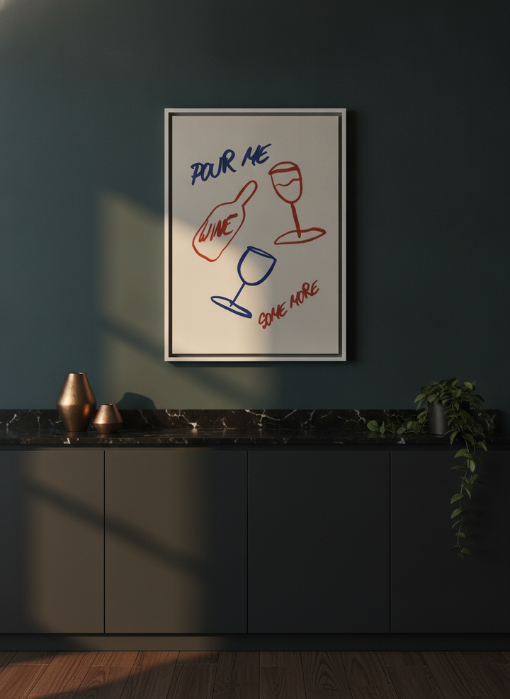 Canvas wall art with a white surround styled on the wall in a moody kitchen