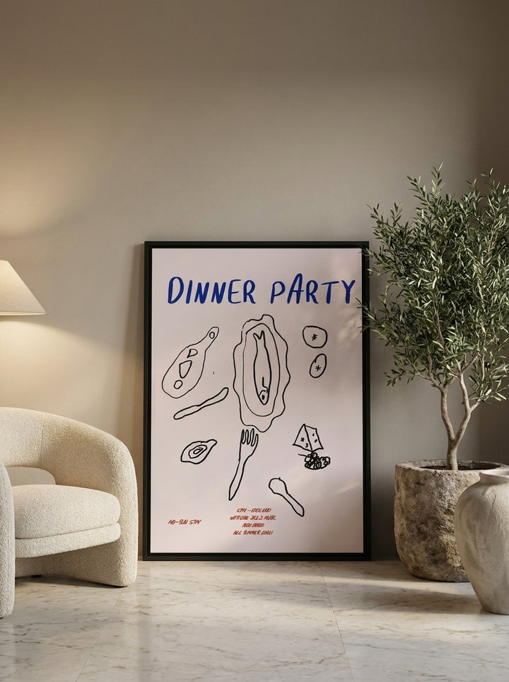 Canvas wall art with a black surround leaning against the wall in a luxe dining room