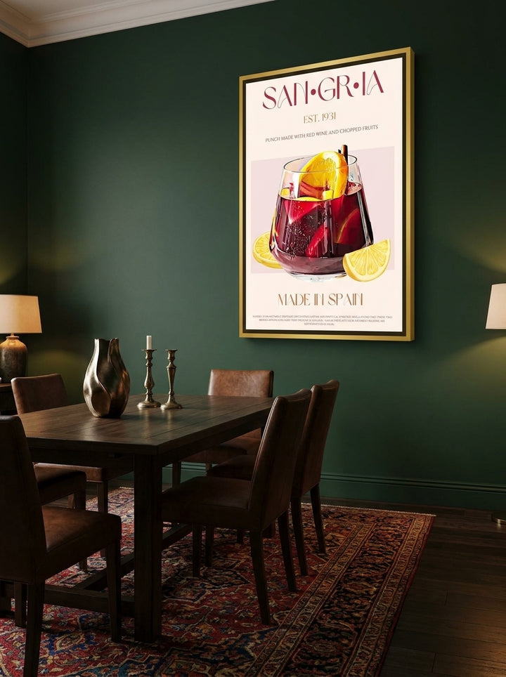 Oversized statement canvas wall art with a gold leaf surround styled on the wall in a moody dining room