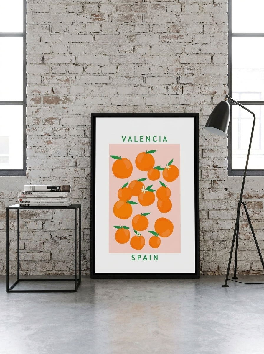 Canvas wall art with a black surround leaning against the wall in an industrial loft kitchen
