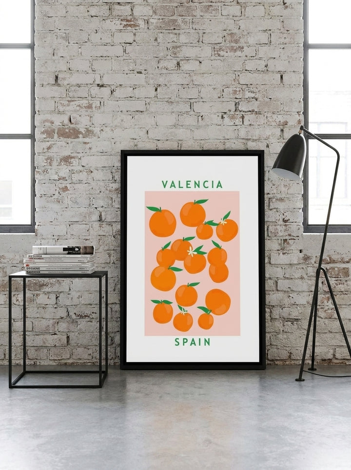 Canvas wall art with a black surround leaning against the wall in an industrial loft kitchen