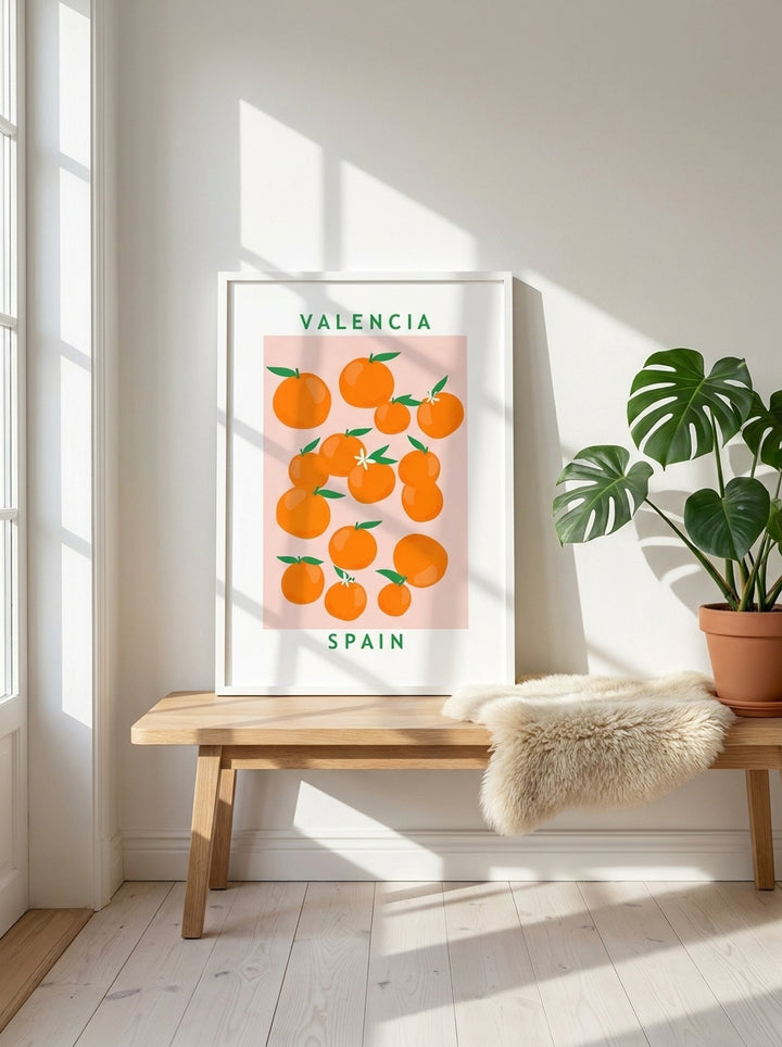 Modern wall art print standing on a bench in a bright Scandinavian living room