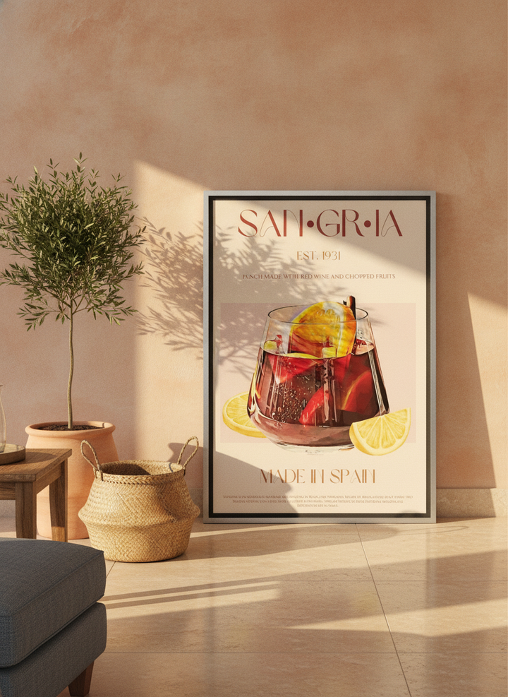 Canvas wall art with a silver leaf surround leaning against the wall in a Mediterranean living room