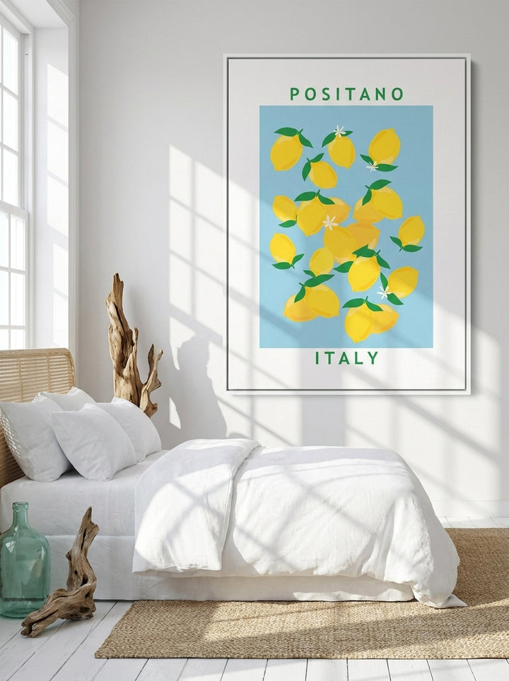 Oversized statement canvas wall art with a white surround styled on the wall in a coastal bedroom