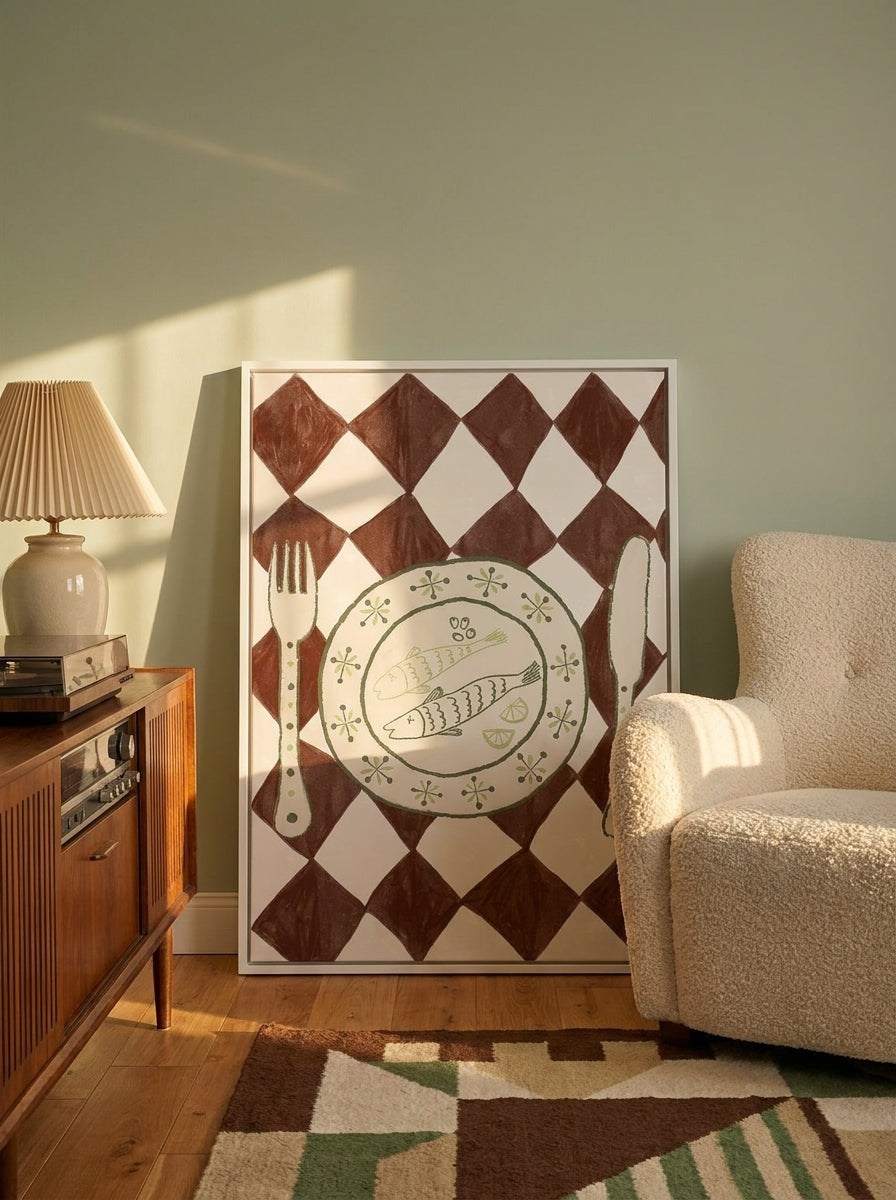 Canvas wall art with a white surround leaning against the wall in a mid-century kitchen