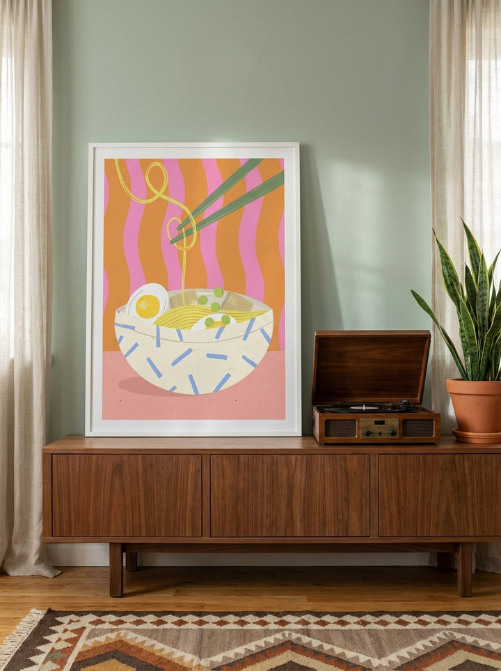 Modern wall art print standing on a sideboard in a mid-century living room
