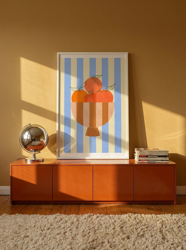Modern wall art print standing on a sideboard in a retro 70s dining room