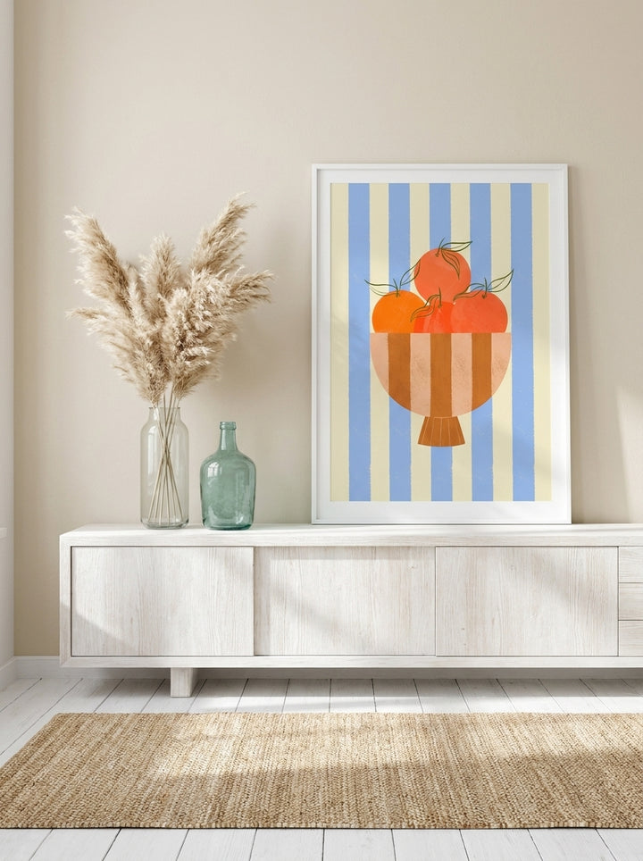 Modern wall art print standing on a console in a coastal living room