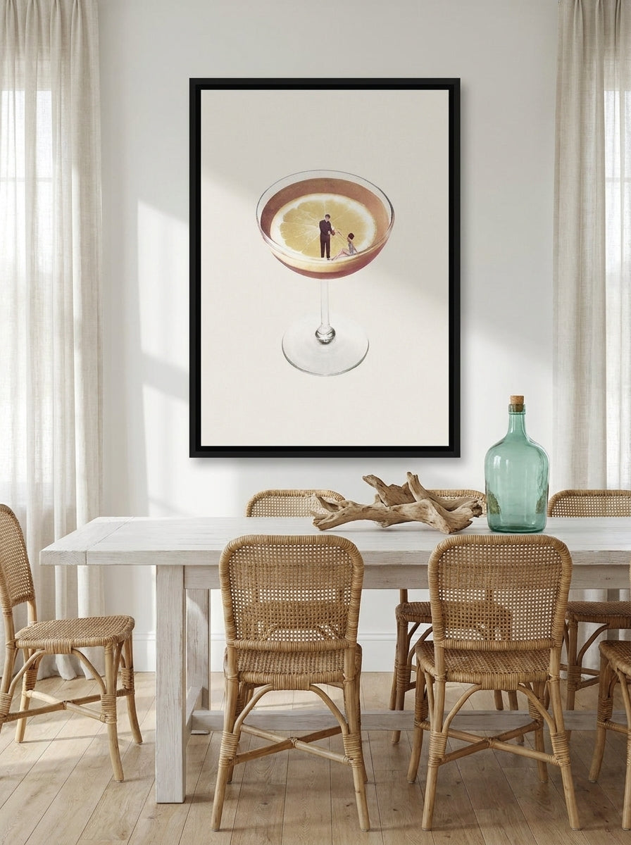 Canvas wall art with a black surround styled on the wall in a coastal dining room