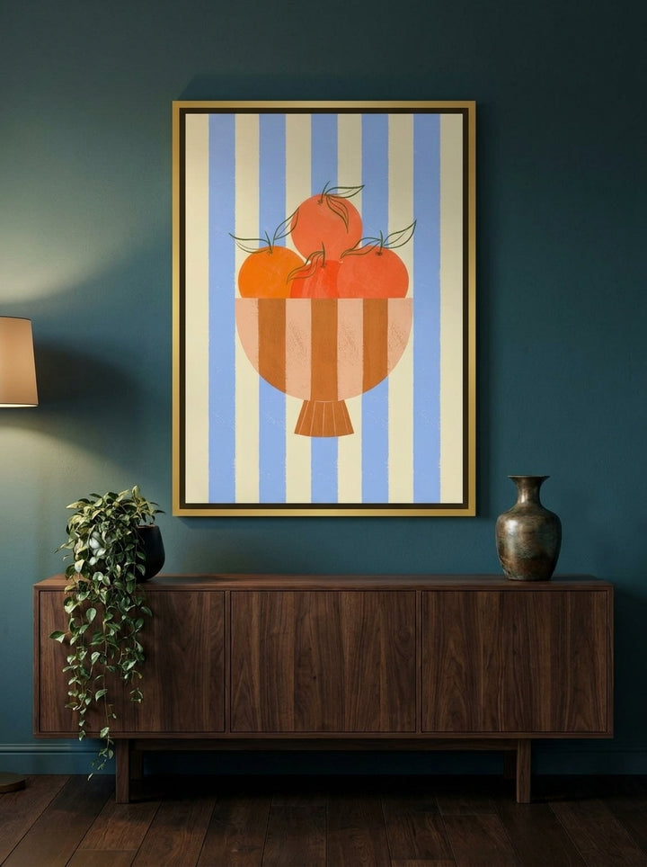 Canvas wall art with a gold leaf surround styled on the wall in a moody living room