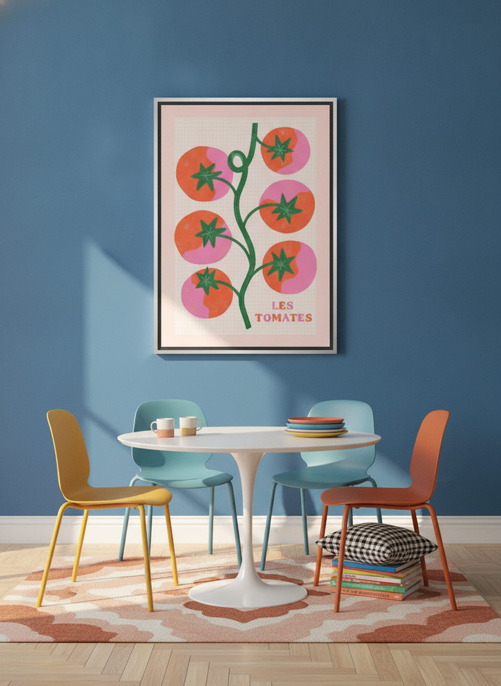 Canvas wall art with a silver leaf surround styled on the wall in a colourful eclectic dining room