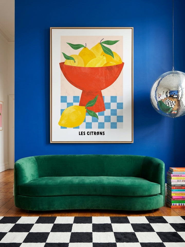 Oversized statement canvas wall art with a natural timber surround styled on the wall in a colourful eclectic living room
