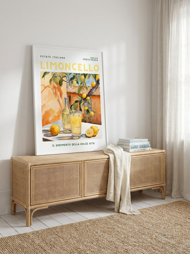 Modern wall art print standing on a sideboard in a coastal living room