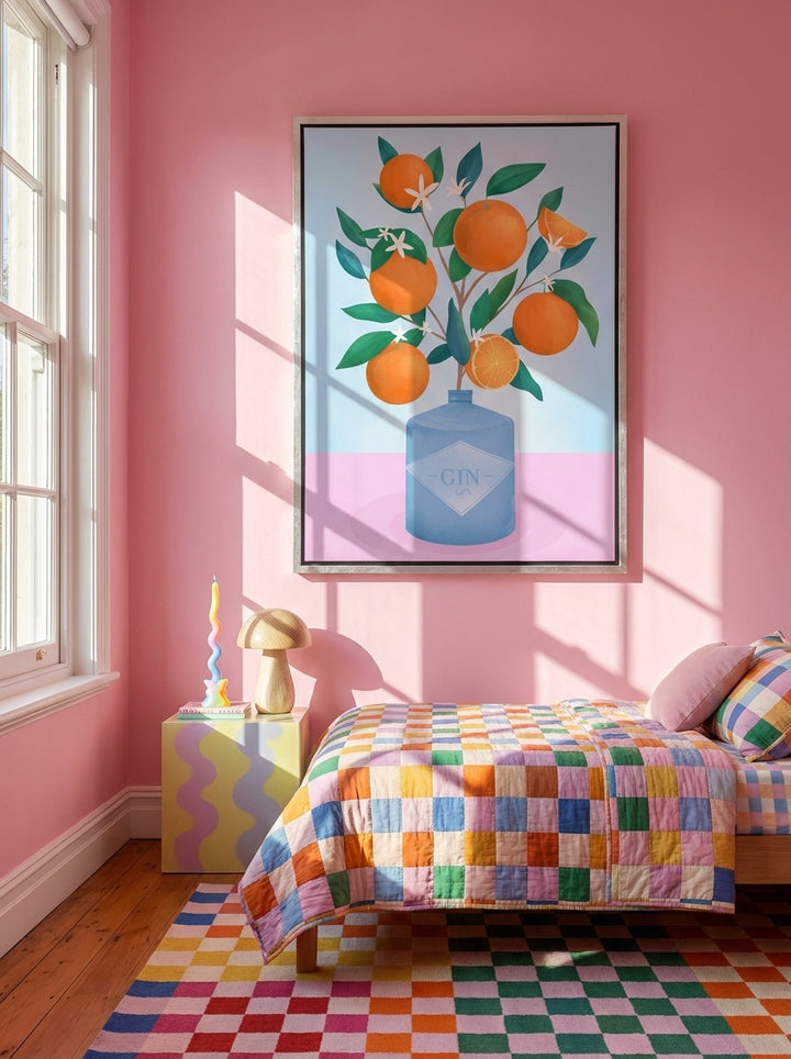 Canvas wall art with a silver leaf surround styled on the wall in a colourful eclectic bedroom