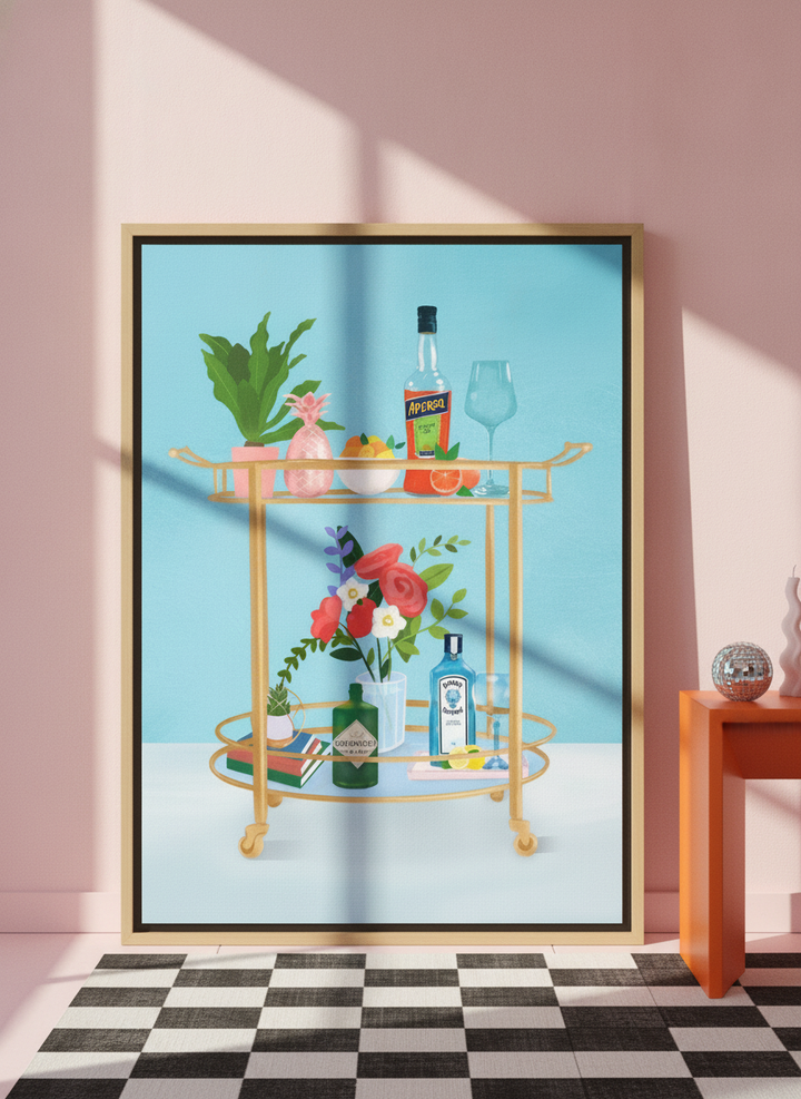 Oversized statement canvas wall art with a natural timber surround leaning against the wall in a colourful eclectic living room