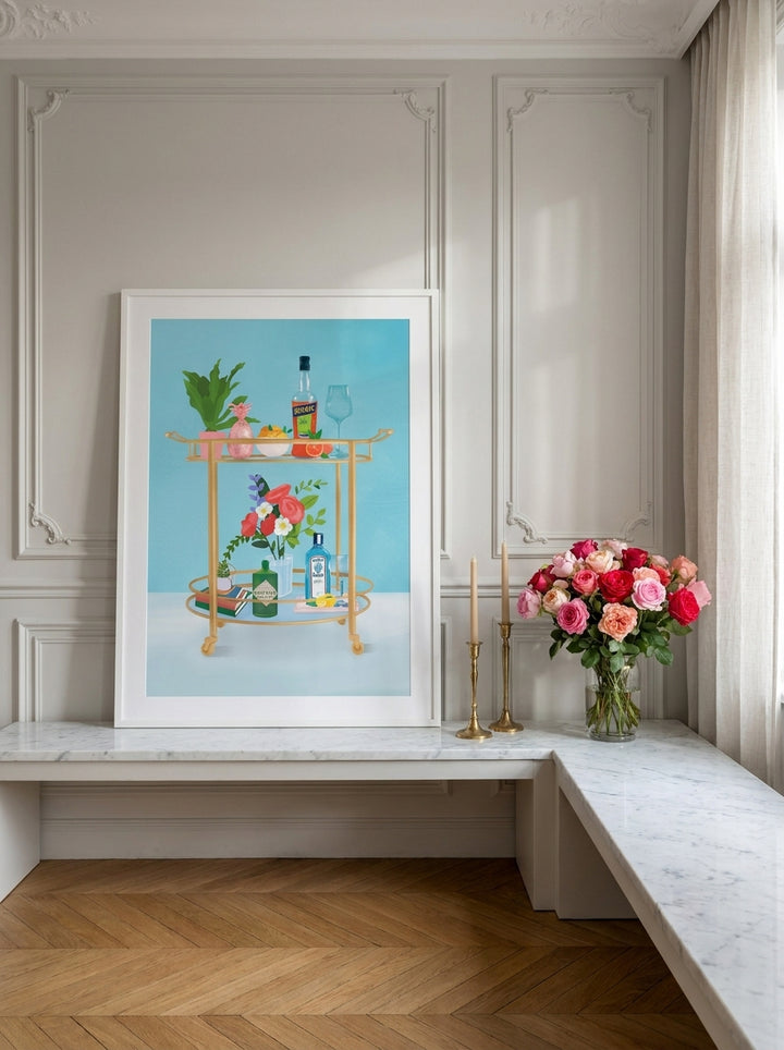 Modern wall art print standing on a kitchen bench in a Parisian kitchen