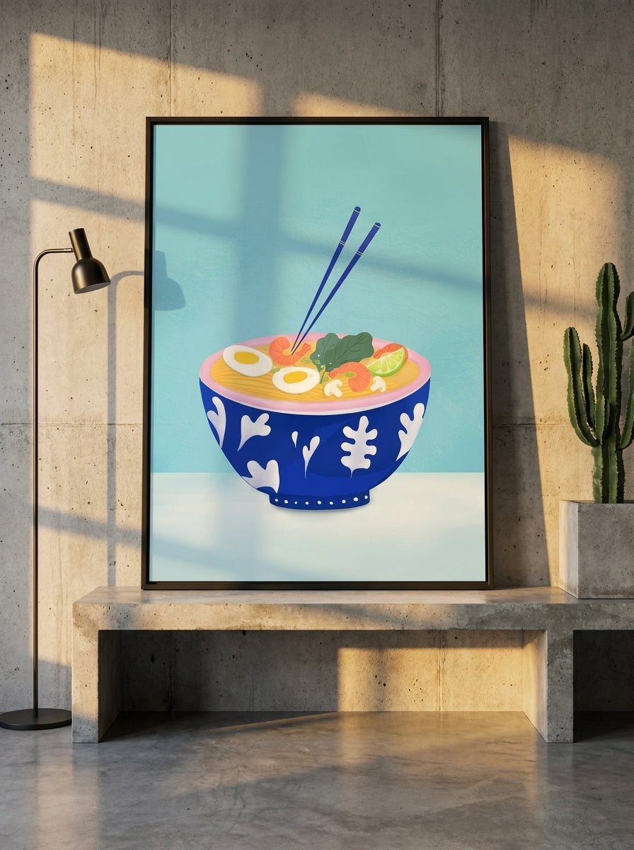 Canvas wall art with a black surround standing on a kitchen bench in an industrial loft kitchen
