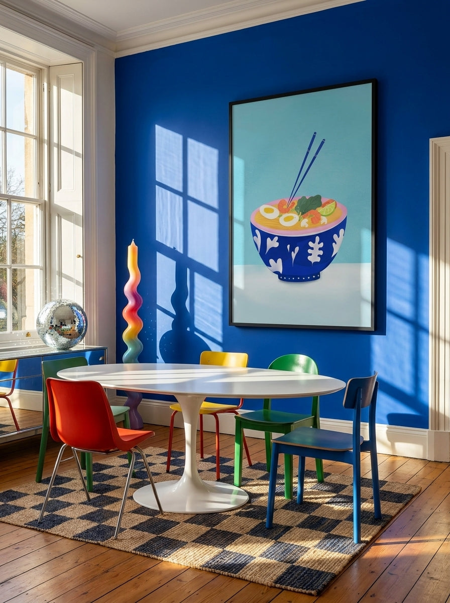 Oversized statement modern wall art print styled on the wall in a colourful eclectic dining room