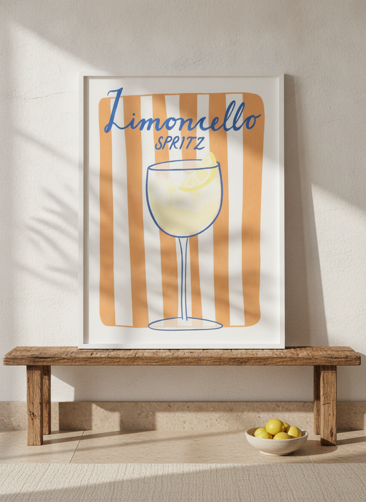 Modern wall art print standing on a bench in a Mediterranean living room