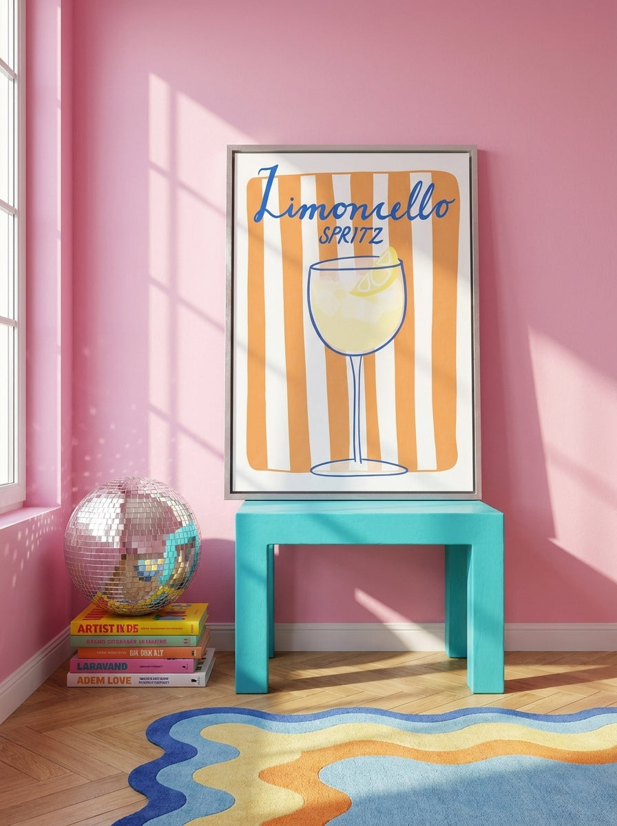 Canvas wall art with a silver leaf surround standing on a side table in a colourful eclectic bedroom