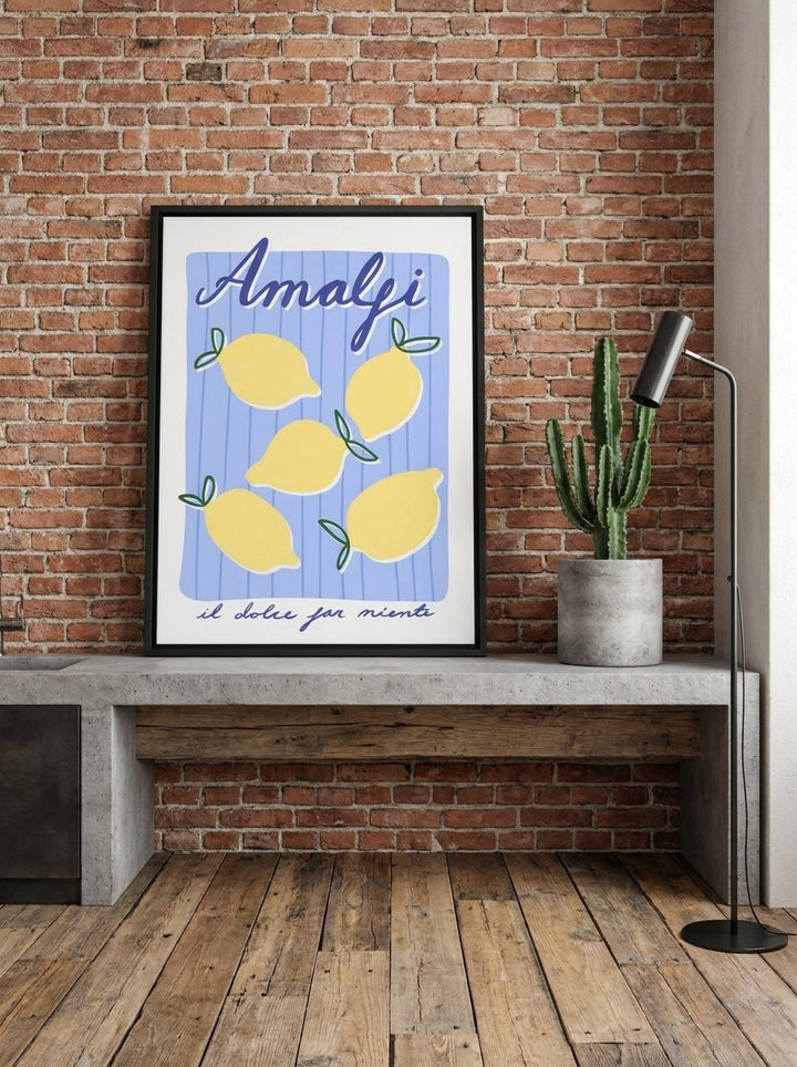 Canvas wall art with a black surround standing on a kitchen bench in an industrial loft kitchen