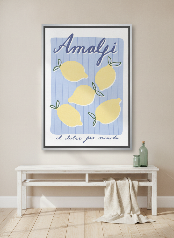 Canvas wall art with a silver leaf surround styled on the wall in a coastal living room