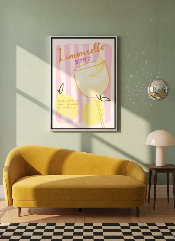 Canvas wall art with a silver leaf surround styled on the wall in a colourful eclectic living room