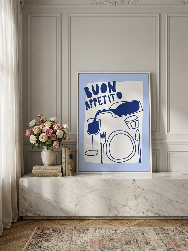 Canvas wall art with a white surround standing on a kitchen bench in a Parisian kitchen