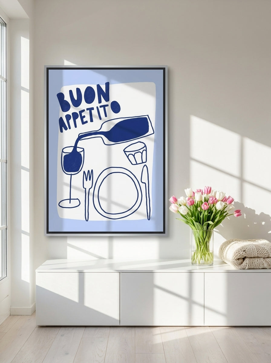Canvas wall art with a silver leaf surround styled on the wall in a bright Scandinavian living room