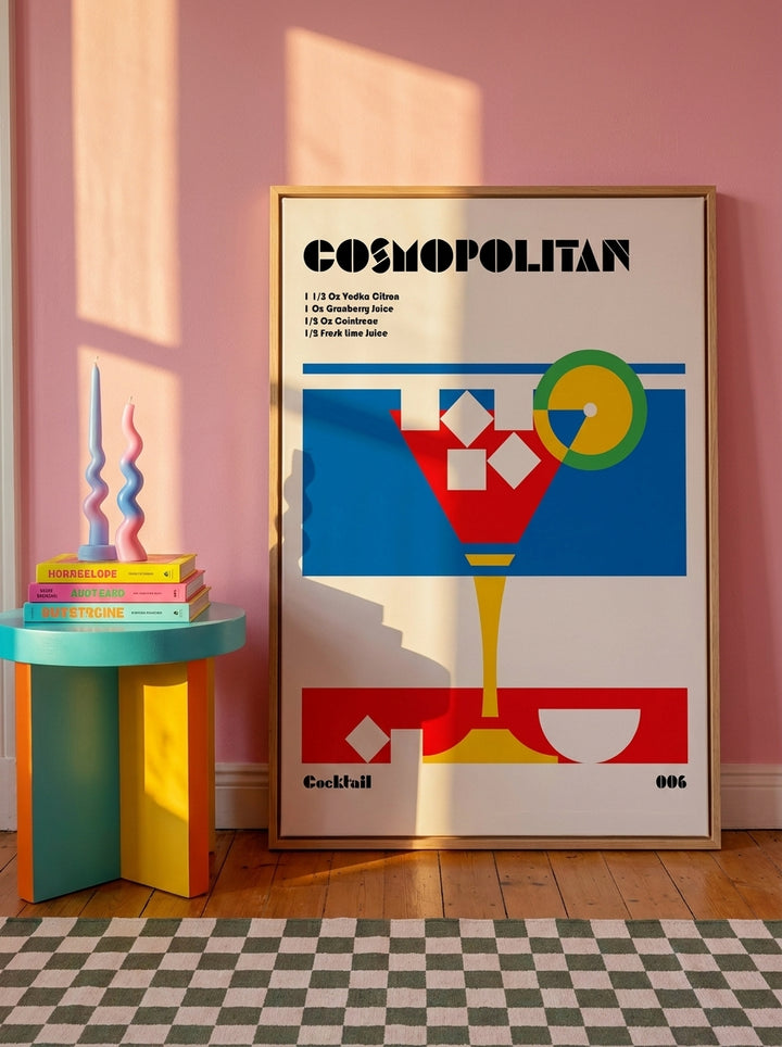 Oversized statement canvas wall art with a natural timber surround leaning against the wall in a colourful eclectic dining room