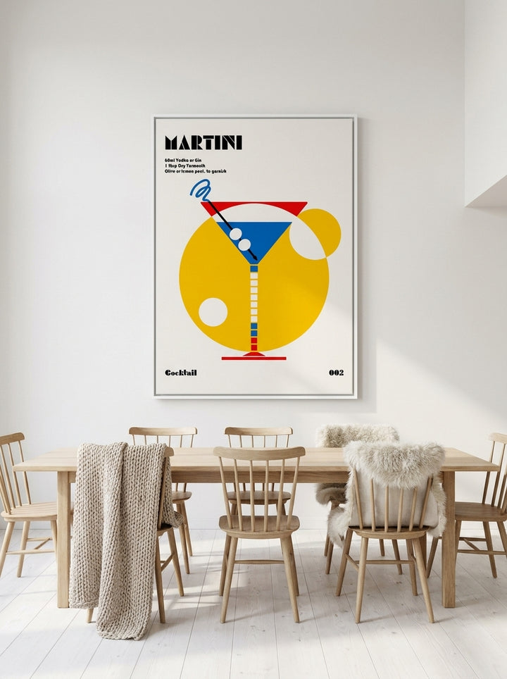 Oversized statement canvas wall art with a white surround styled on the wall in a bright Scandinavian dining room