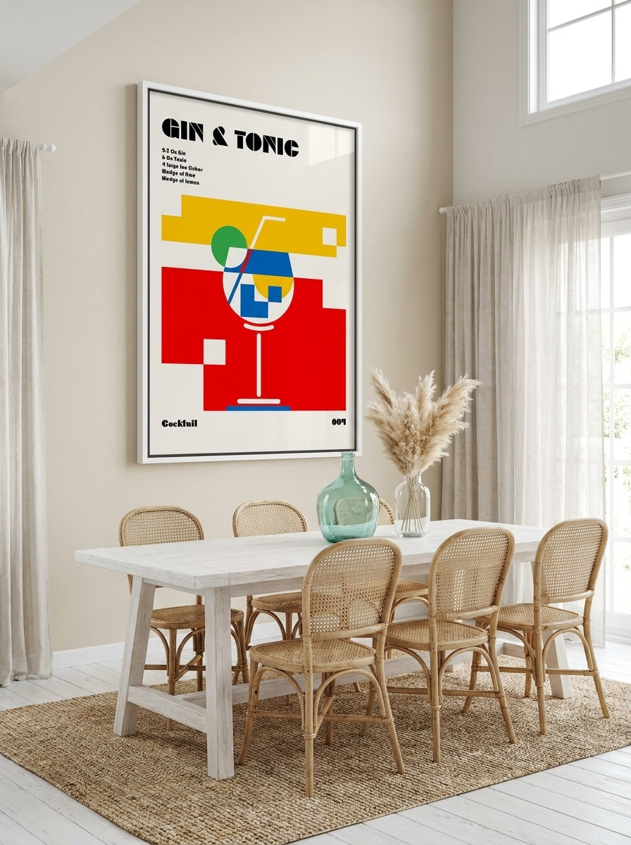 Oversized statement canvas wall art with a white surround styled on the wall in a coastal dining room
