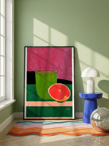 Oversized statement modern wall art print leaning against the wall in a colourful eclectic dining room